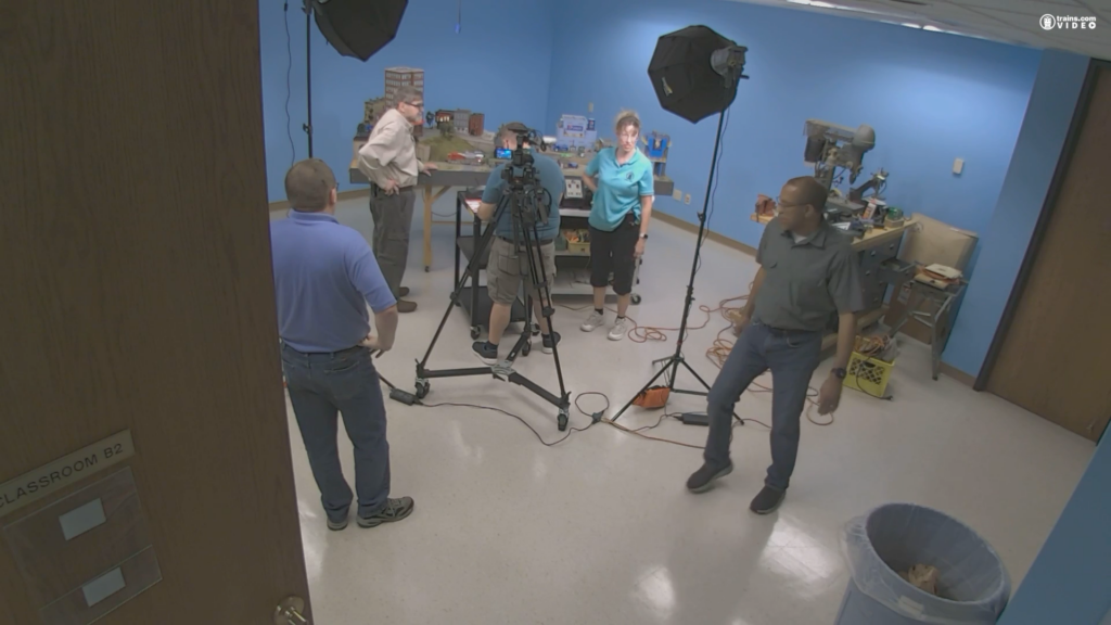 Screenshot of Classic Toy Trains and Model Railroader staffers shooting a video on the Trains.com Workshop Webcam